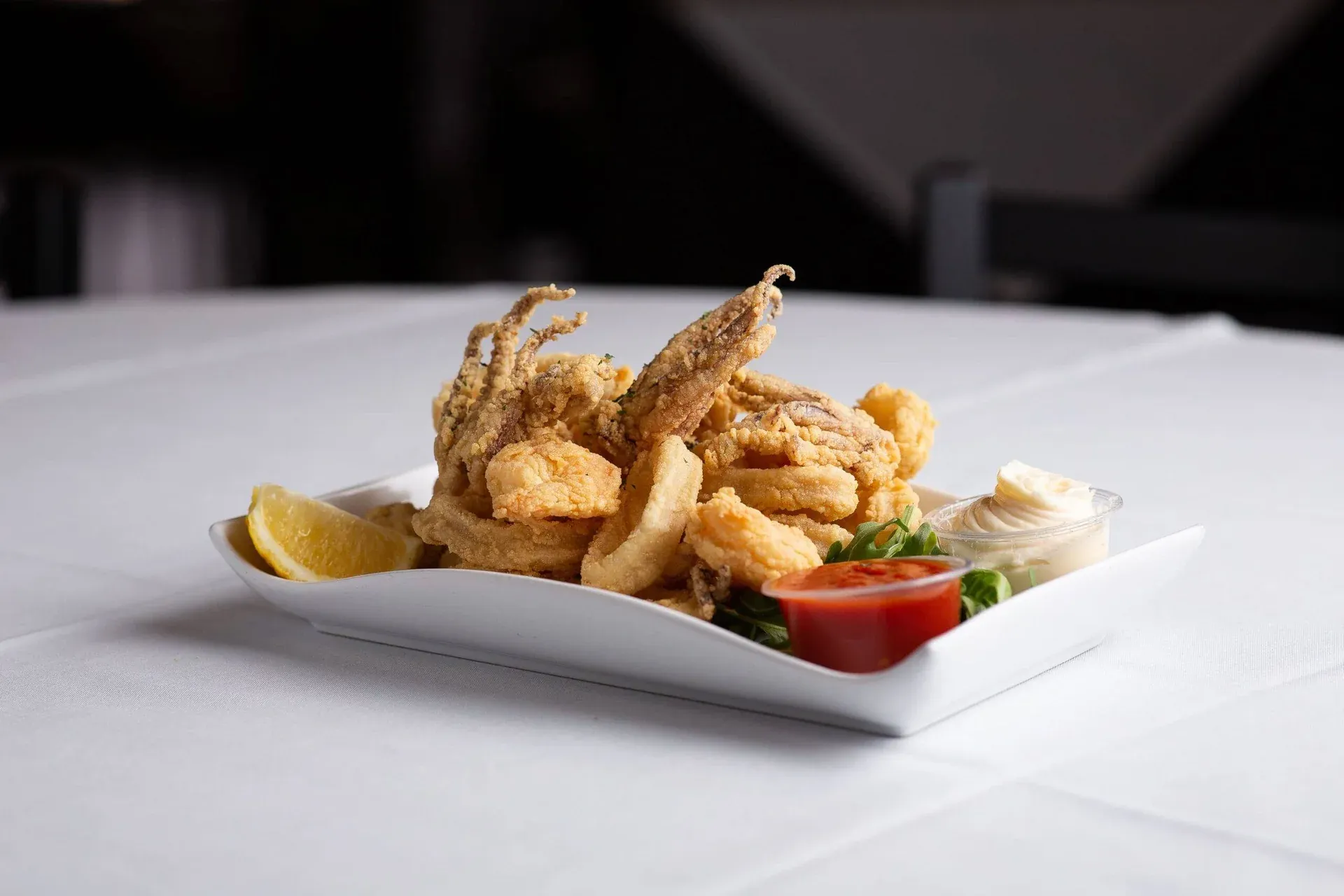 A seafood dish prepared at Carmine’s