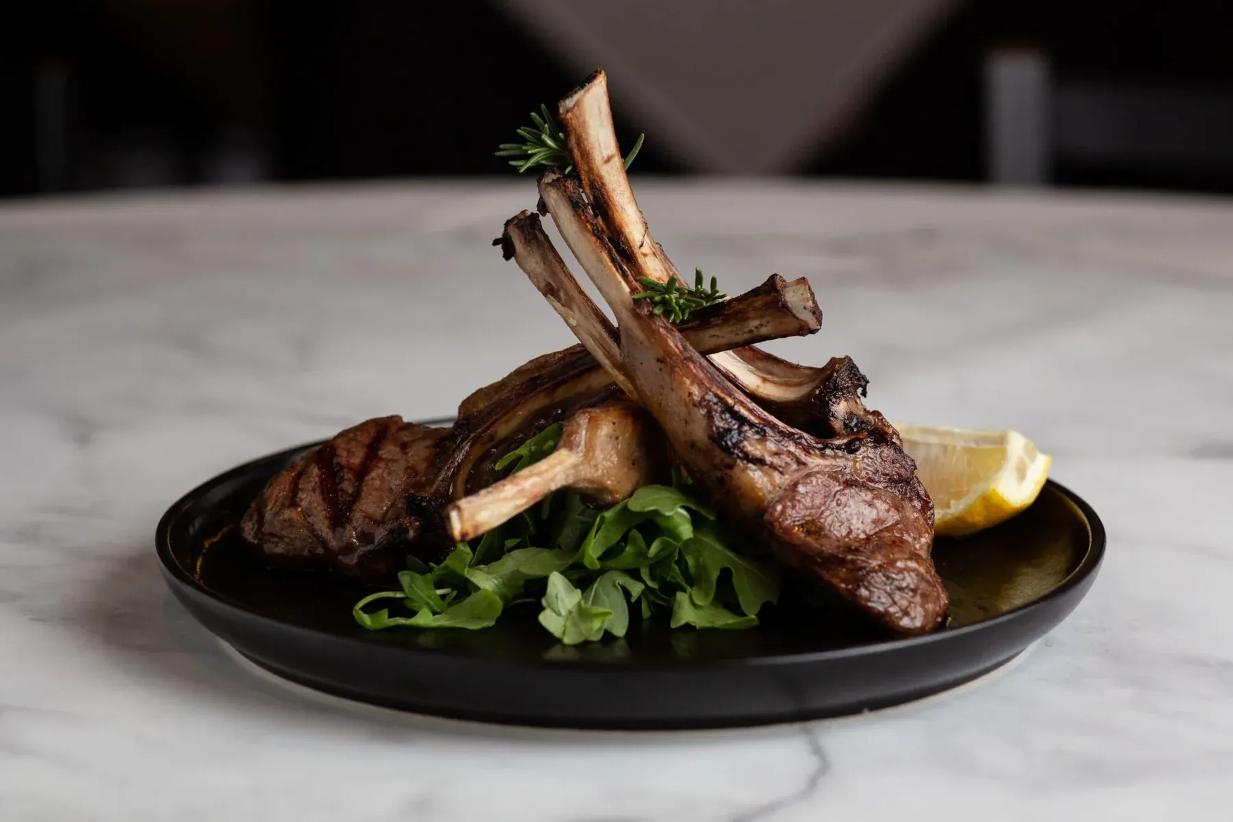 Grilled lamb dish served at Carmine’s
